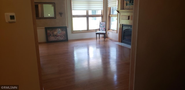 unfurnished living room featuring hardwood / wood-style floors