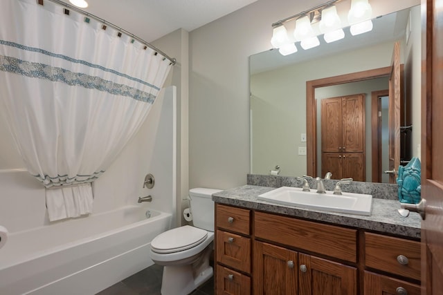 full bathroom with toilet, shower / tub combo, and vanity