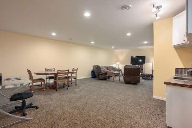 dining room featuring carpet floors