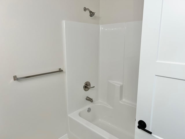 bathroom with shower / bathing tub combination