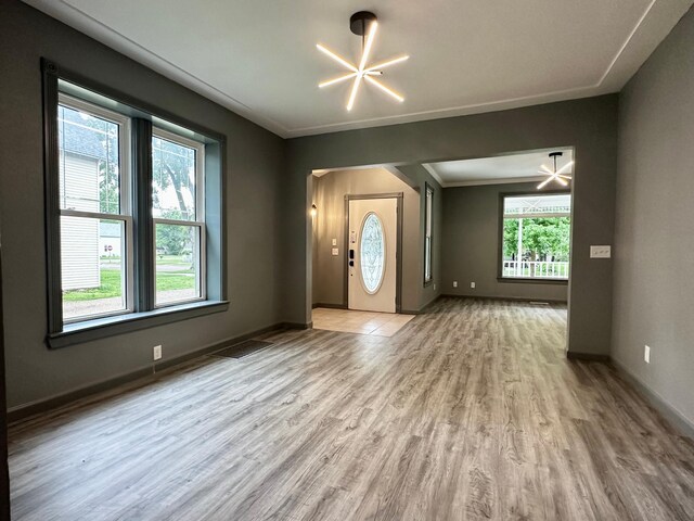 foyer with light hardwood / wood-style flooring