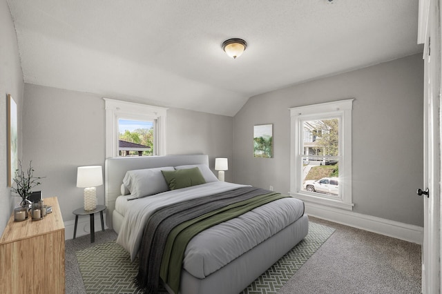 2806 Aldrich Ave N, Minneapolis, MN 55411 - bedroom featuring carpet flooring, lofted ceiling, and baseboards