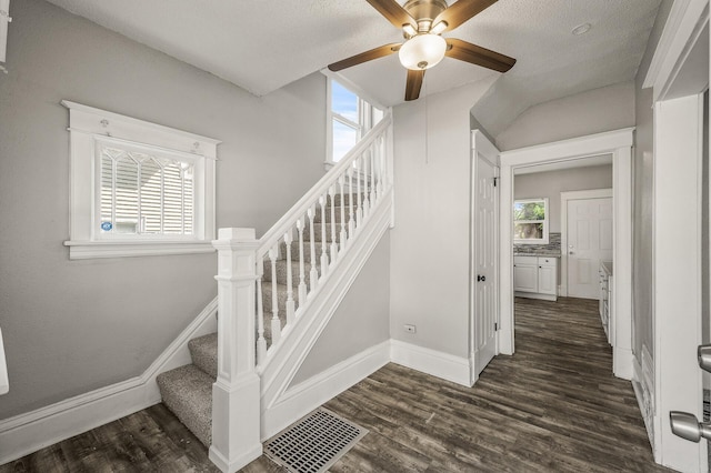 2806 Aldrich Ave N, Minneapolis, MN 55411 - stairs with ceiling fan, wood finished floors, and baseboards