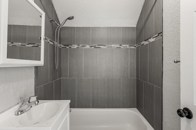 2806 Aldrich Ave N, Minneapolis, MN 55411 - full bathroom featuring a textured ceiling, a shower, and vanity