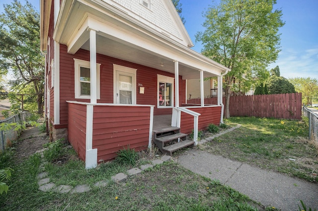 2806 Aldrich Ave N, Minneapolis, MN 55411 - view of front of property with a porch and fence