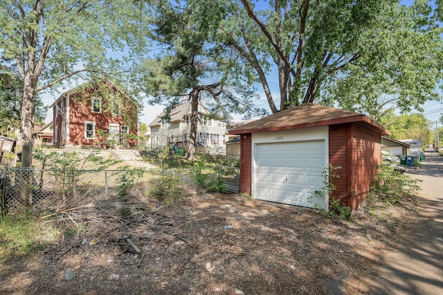 2806 Aldrich Ave N, Minneapolis, MN 55411 - detached garage featuring fence and dirt driveway