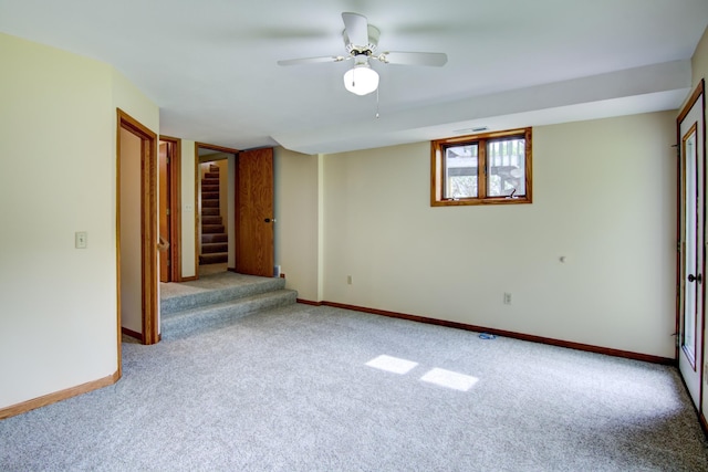 empty room with carpet and ceiling fan