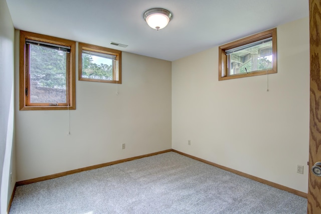 spare room with carpet flooring