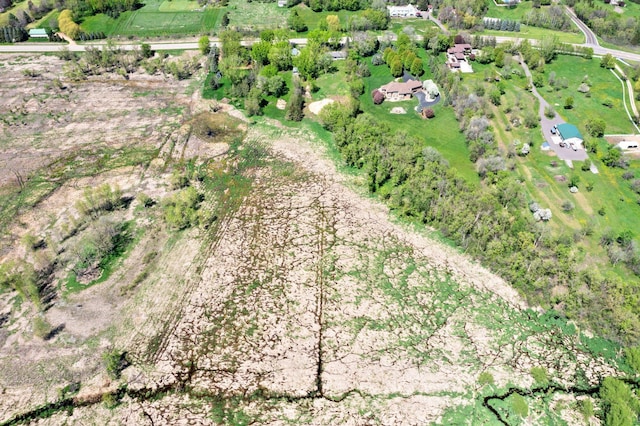 birds eye view of property featuring a rural view