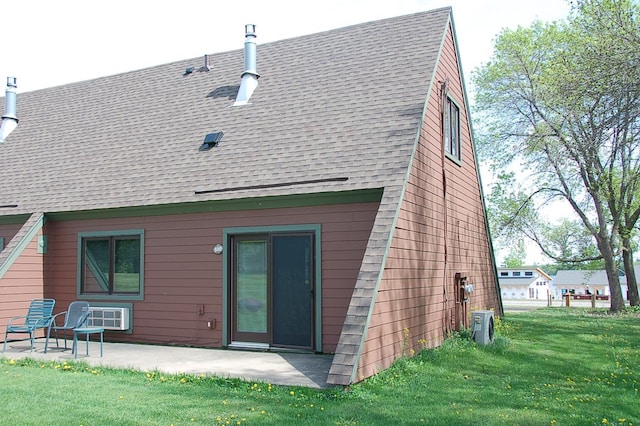 25124 Tame Fish Lake Rd Unit 550, Deerwood, MN 56444 - back of property featuring a patio, roof with shingles, and a yard