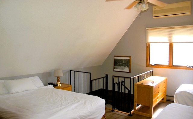 bedroom with a baseboard radiator, an AC wall unit, hardwood / wood-style flooring, ceiling fan, and vaulted ceiling