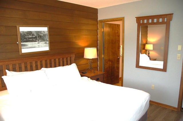25124 Tame Fish Lake Rd Unit 550, Deerwood, MN 56444 - bedroom featuring baseboards and wood finished floors