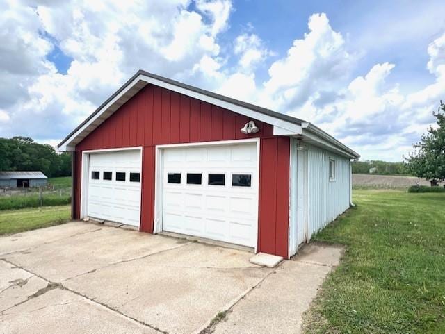 garage with a yard