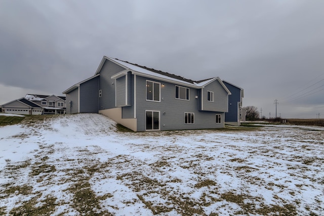 view of snow covered property