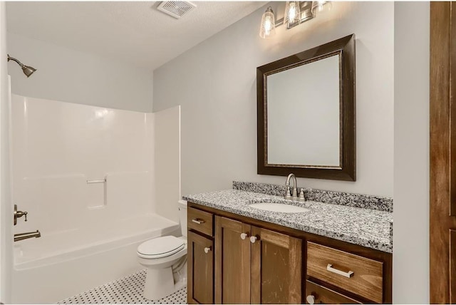 full bathroom with shower / tub combination, vanity, a textured ceiling, and toilet