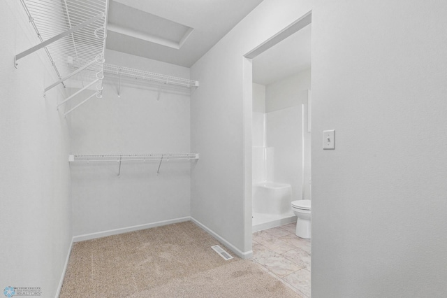 walk in closet with carpet and visible vents