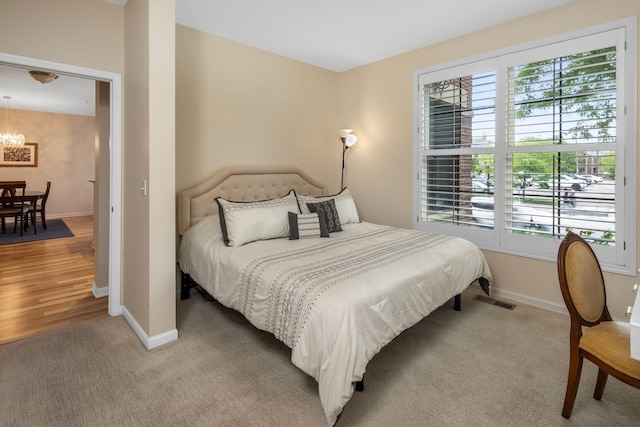 bedroom featuring light wood-type flooring