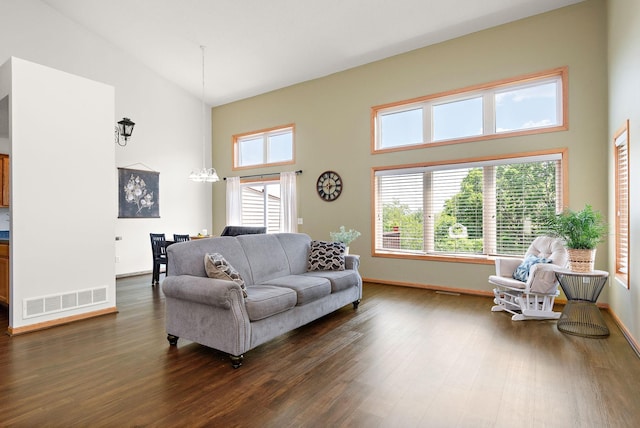 3799 Larabee Ave NE, Saint Michael, MN 55376 - living area with high vaulted ceiling, dark wood finished floors, and plenty of natural light