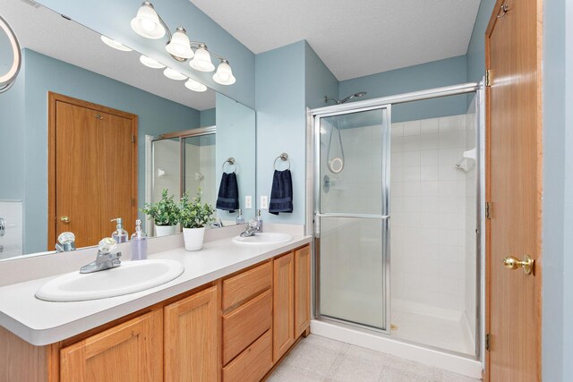 3799 Larabee Ave NE, Saint Michael, MN 55376 - bathroom featuring double vanity and a stall shower