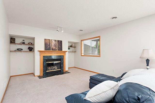 3799 Larabee Ave NE, Saint Michael, MN 55376 - living room featuring carpet, a fireplace, and built in shelves