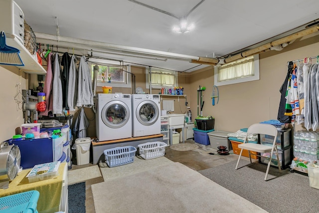 washroom with washer and clothes dryer