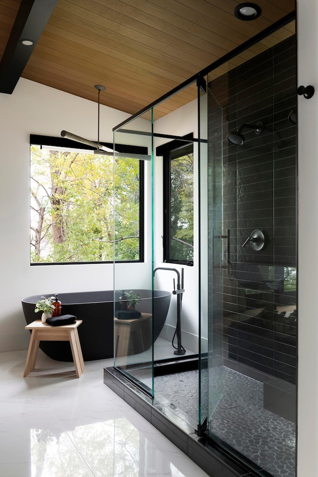 bathroom featuring an enclosed shower and wood ceiling