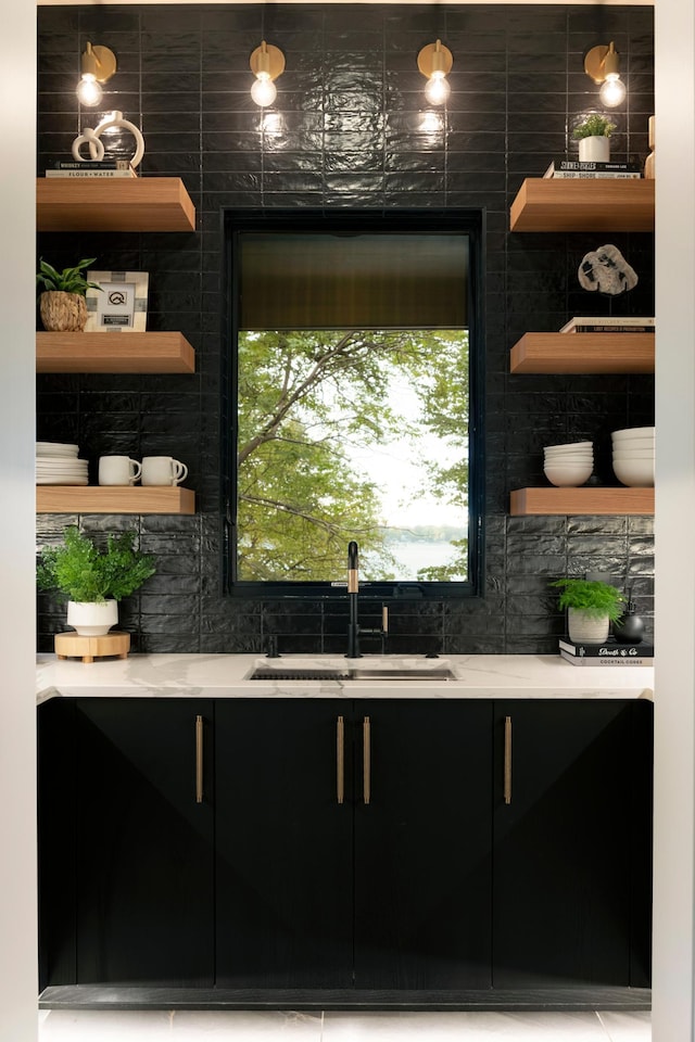 bar featuring a sink