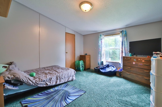 carpeted bedroom featuring vaulted ceiling and a textured ceiling