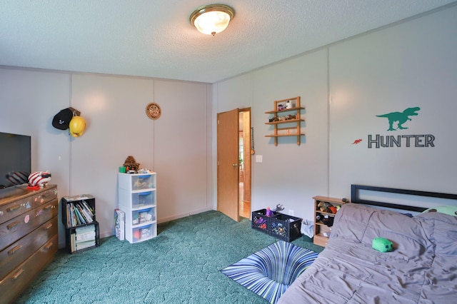 bedroom featuring a textured ceiling and carpet floors