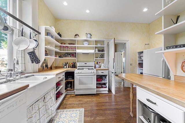 kitchen with white appliances, under cabinet range hood, dark wood-style floors, and open shelves