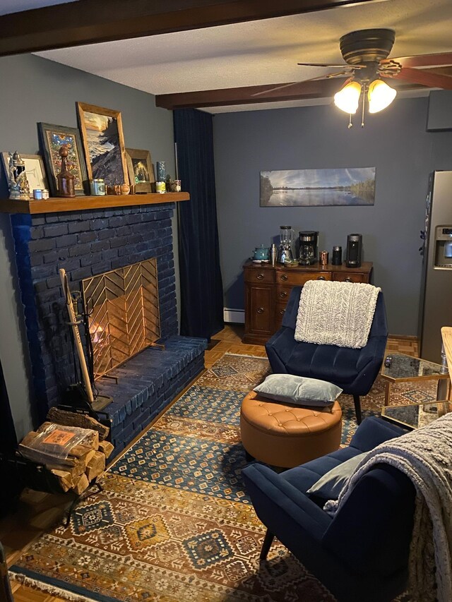 living room with baseboard heating, ceiling fan, and a brick fireplace