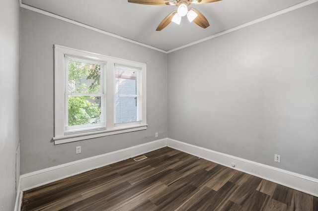 unfurnished room featuring ceiling fan, dark hardwood / wood-style floors, and crown molding