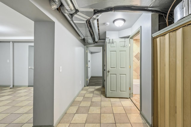 basement with light tile patterned floors