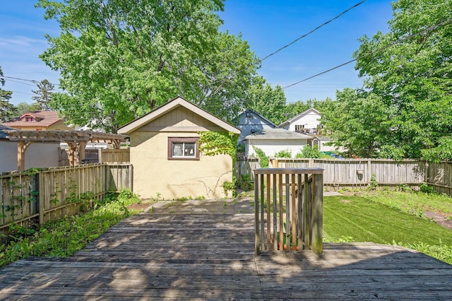 wooden deck with a lawn