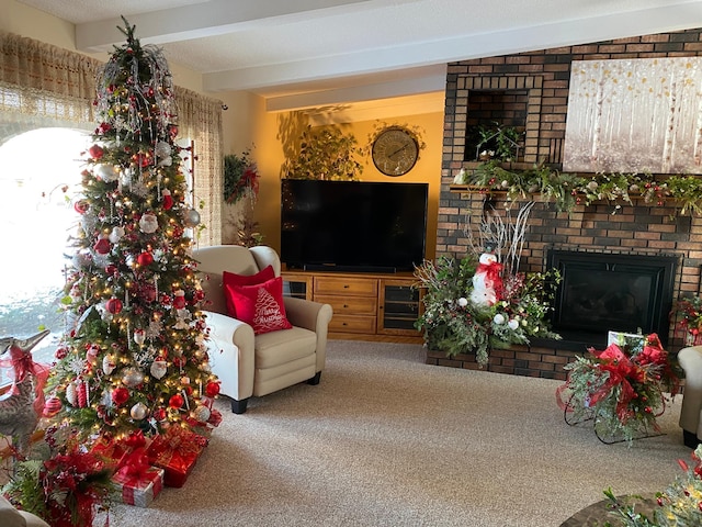 living room with beam ceiling, carpet floors, and a wealth of natural light