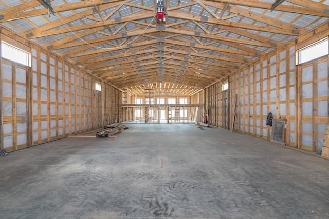 miscellaneous room with a wealth of natural light and vaulted ceiling