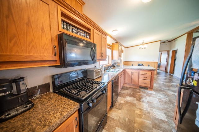 kitchen with ornamental molding, light tile patterned floors, stone countertops, and black appliances