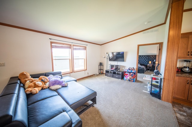 carpeted living room featuring crown molding and vaulted ceiling