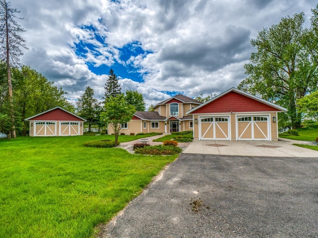 view of front facade with a front lawn and a garage