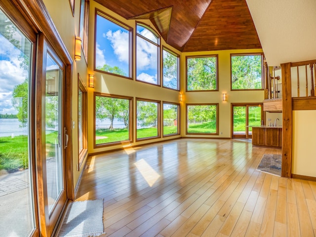 unfurnished sunroom featuring wood ceiling