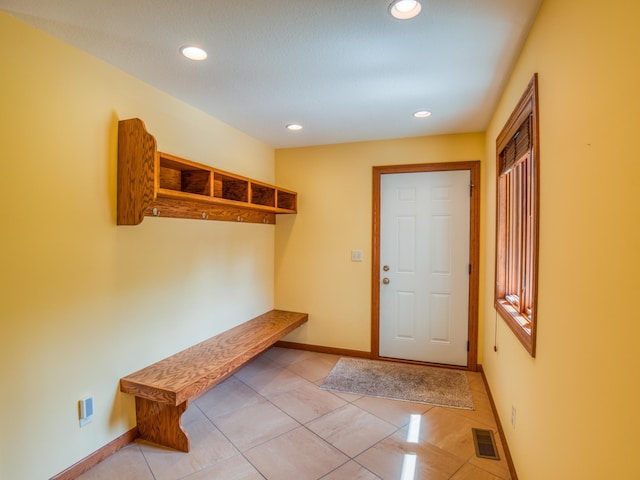 mudroom featuring light tile patterned floors