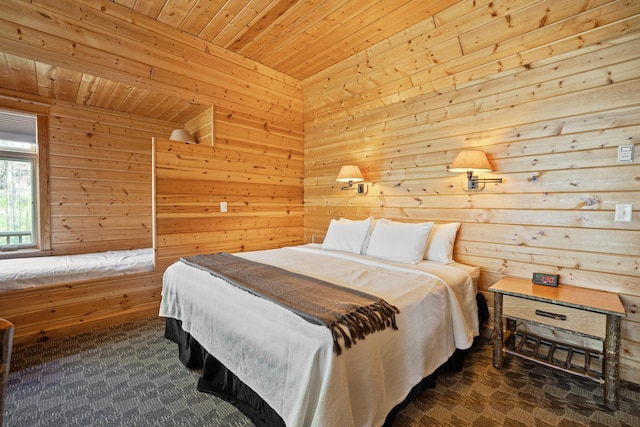 2799DOUGLAS 27th St Unit 9, Douglas Cabin, Birchwood, WI 54817 - bedroom with wood ceiling, wooden walls, and carpet