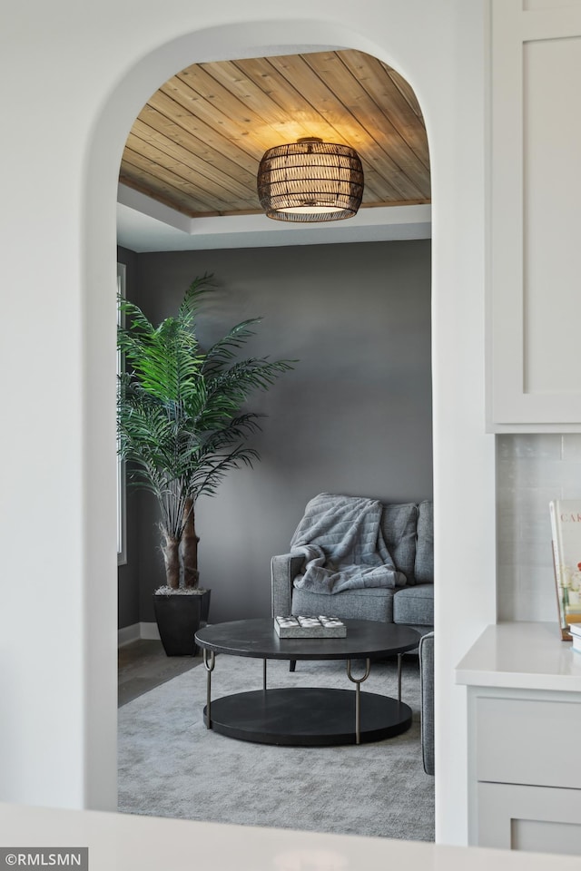 sitting room with wooden ceiling