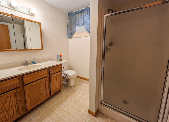815 6th Ave NE, Perham, MN 56573 - full bathroom with a shower stall, vanity, toilet, and baseboards