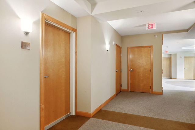 corridor featuring carpet flooring