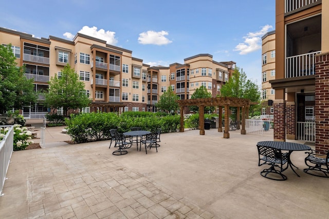 view of home's community featuring a pergola