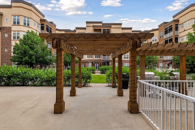 view of home's community featuring a pergola