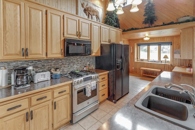 kitchen featuring decorative backsplash, light tile patterned flooring, black appliances, light brown cabinetry, and sink