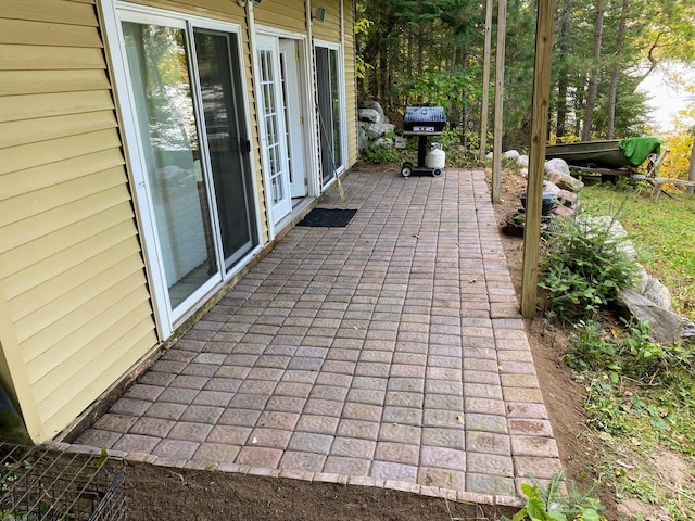 view of patio featuring a grill