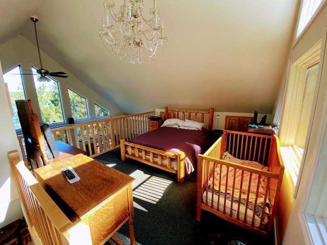 carpeted bedroom featuring a chandelier and lofted ceiling